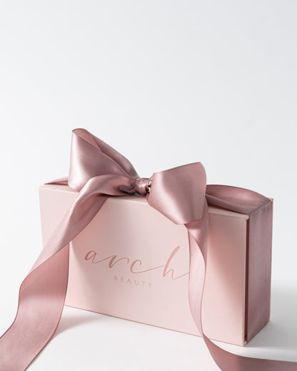 Arch Beauty box with a bow